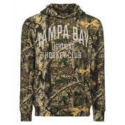 A camouflage pullover hoodie featuring a woodland tree-bark and leaf pattern in shades of brown, green, and beige, with 'TAMPA BAY LIGHTNING HOCKEY CLUB' printed in white across the chest.