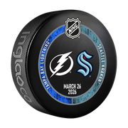 Hockey puck with NHL logo and Tampa Bay Lightning and Seattle Kraken logos on a white background