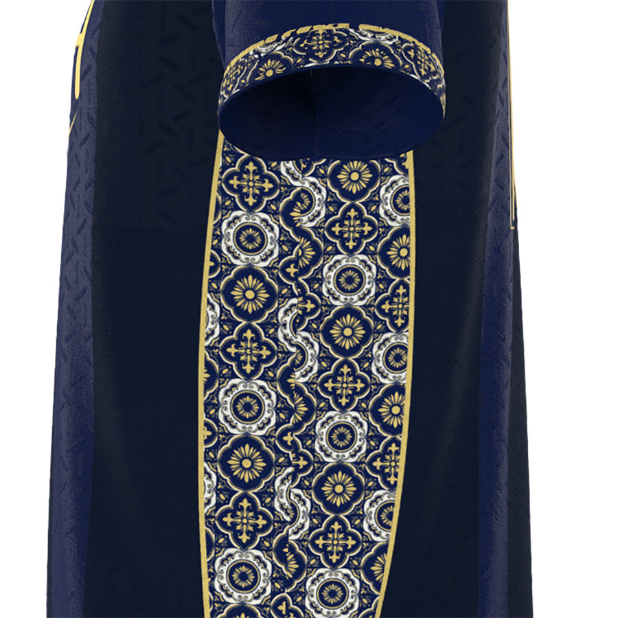 A close-up of a dark navy blue garment, likely a robe or vestment, featuring an ornate vertical panel with a white and gold geometric floral pattern and a matching patterned cuff.